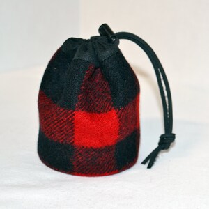 handmade drawstring bag made of Pendleton Wool Filson Blanket red and black plaid use as a golf tee bag golf balls valuable pouch great for any sport about 5 inches tall 3.5 inches wide circular bag leather drawstring golfer gift christmas