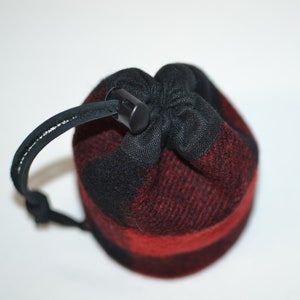 handmade drawstring bag made of Pendleton Wool Filson Blanket red and black plaid use as a golf tee bag golf balls valuable pouch great for any sport about 5 inches tall 3.5 inches wide circular bag leather drawstring golfer gift christmas