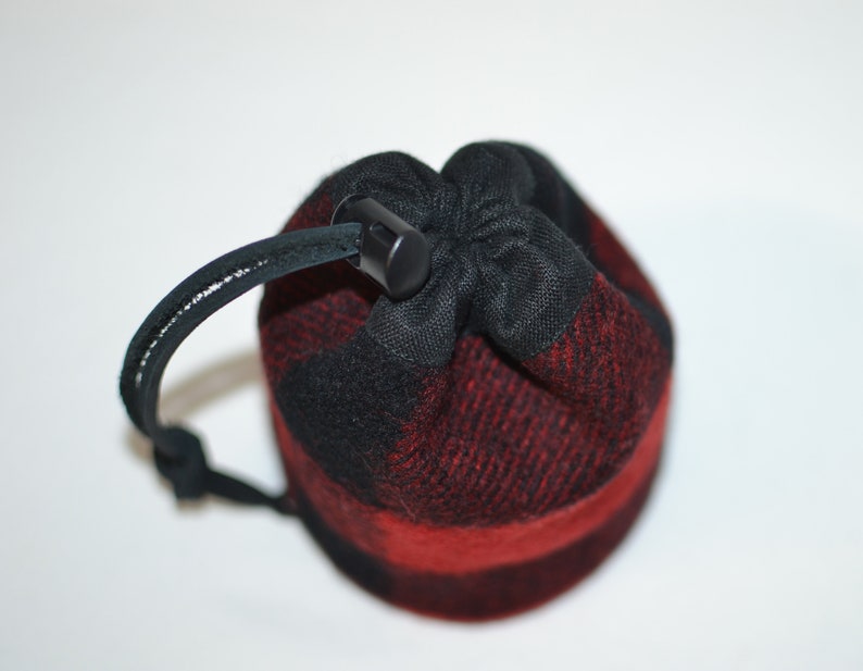 handmade drawstring bag made of Pendleton Wool Filson Blanket red and black plaid use as a golf tee bag golf balls valuable pouch great for any sport about 5 inches tall 3.5 inches wide circular bag leather drawstring golfer gift christmas