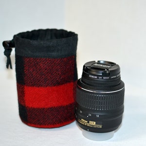 handmade drawstring bag made of Pendleton Wool Filson Blanket red and black plaid use as a golf tee bag golf balls valuable pouch great for any sport about 5 inches tall 3.5 inches wide circular bag leather drawstring golfer gift christmas