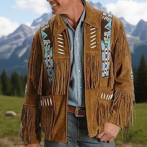 May include: Brown suede jacket with fringe detailing, turquoise and white beadwork, and a notched collar. The jacket features a button-up front and a belt. The jacket is worn over a denim shirt and jeans.