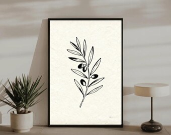 May include: Black and white framed art print featuring a detailed illustration of an olive branch with leaves and olives. The artwork is set against a cream-colored background, creating a minimalist aesthetic. The frame is black.