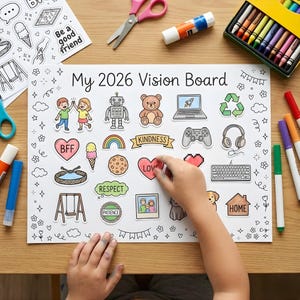 May include: A vision board labelled "My 2026 Vision Board" with stickers of a robot, teddy bear, laptop, and heart. Crayons, scissors, and glue sticks are on the table, indicating a creative project for children.