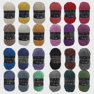 May include: A selection of multi-coloured yarn balls in shades such as cream, yellow, grey, red, brown, pink, purple, blue, black, and green. Each ball is labelled with "TRULY WOOL RICH Four Ply" and weighs 50g.