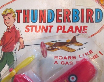 Vintage Thunderbird stunt plane made in Hong Kong Toys R us price sticker race it roars like a gas engine kitschy retro toy collectible