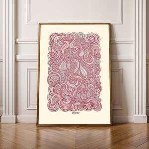 May include: A framed art print with an abstract design in red, pink, and light blue. The artwork is made up of swirling lines, dots, and floral patterns. The text "#FAFSEF" is at the bottom of the print. The frame is brown.