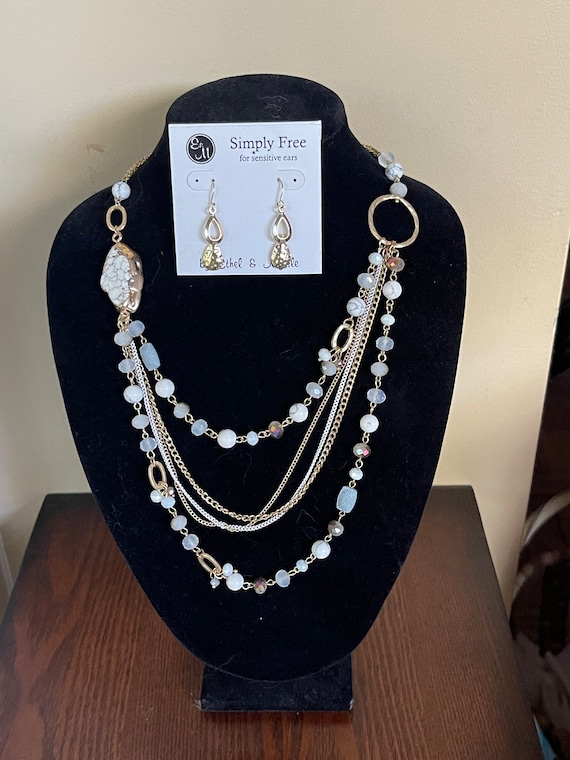 Vintage Ethel & Myrtle gold multi strand howlite and Aurora borealis beaded necklace and gold dangle earrings.