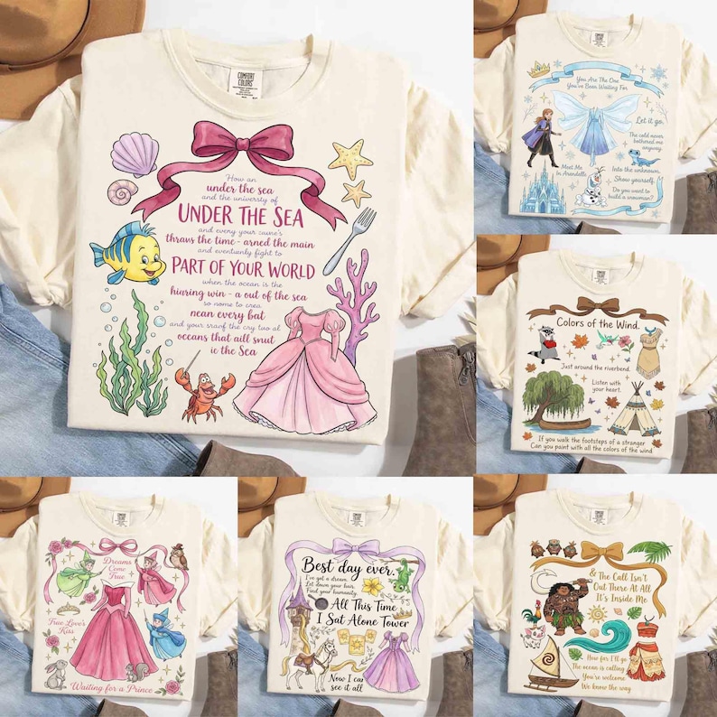 May include: Cream-colored graphic t-shirts featuring various Disney-themed designs. One shirt has the text "Under the Sea" with illustrations of a dress, fish, and coral. Other shirts display "Colors of the Wind", "Best day ever", and other quotes.