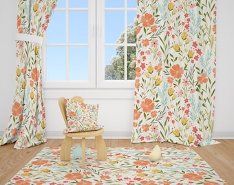 May include: A room setting featuring floral-patterned curtains, a rug, and a pillow. The curtains and rug have a cream background with orange, yellow, and blue flowers. A small wooden chair holds the pillow. The room has a window with a blue sky.