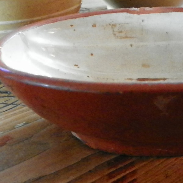 red ware antique mold, crack does not effect mold, solid when you sit it down