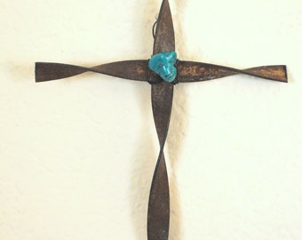 cross made of antique barb wire with turquoise stone wired in back for hanging 4" x 6"