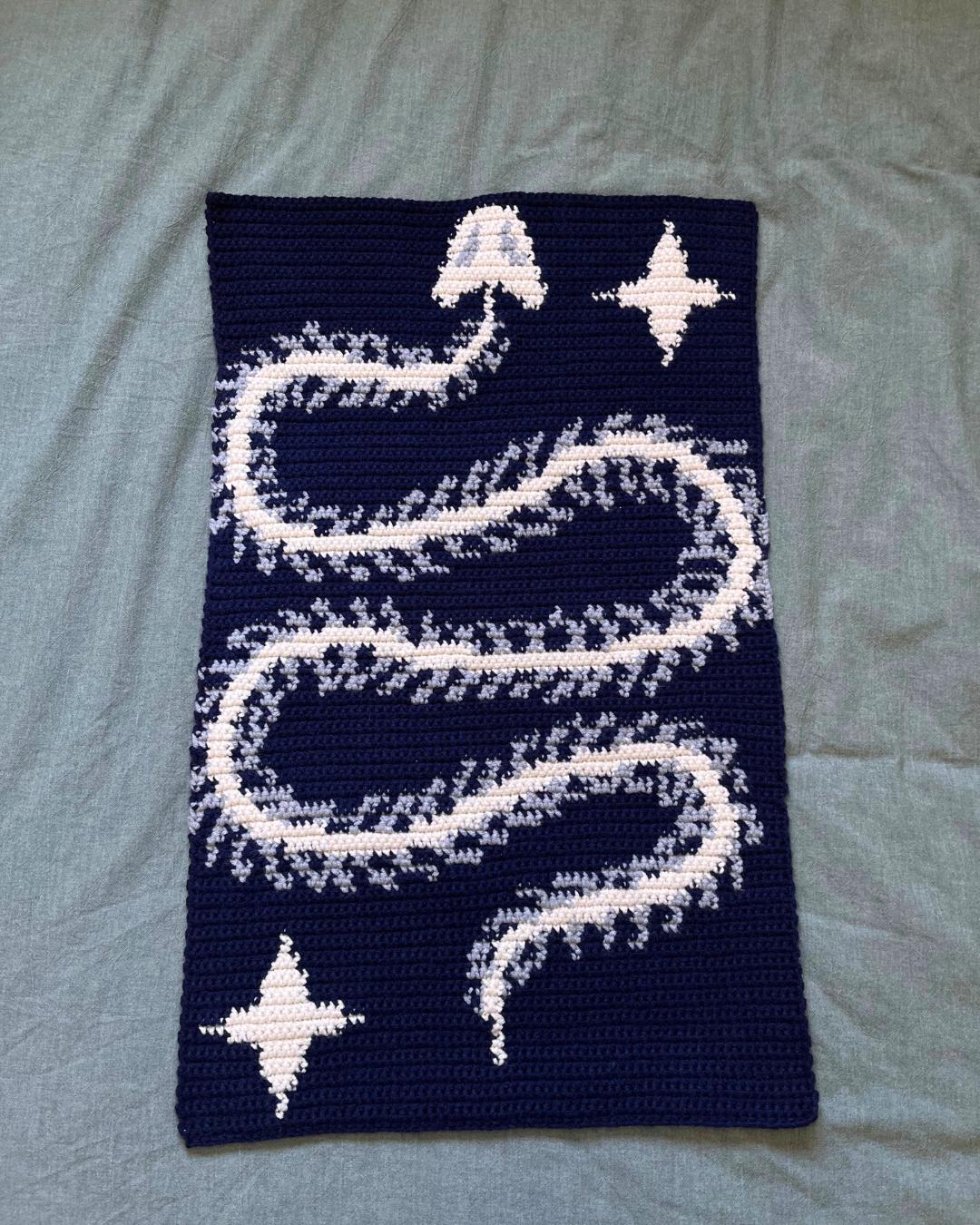 15 Tapestry Crochet Patterns: Our Favorite Wall Art, Bags, and Gifts 9 Snake Skeleton & Stars Crochet Tapestry