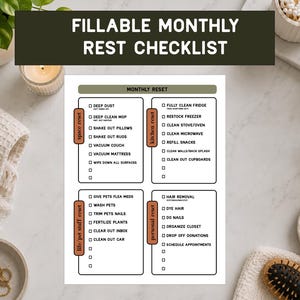 May include: A white paper checklist titled FILLABLE MONTHLY REST CHECKLIST with four sections labelled space reset, kitchen reset, life/pet stuff reset, and personal reset, each containing a list of tasks with checkboxes for monthly organisation.