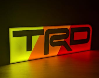 Caixa de luz LED com o logotipo Toyota TRD (Toyota Racing Development)