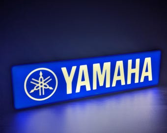 Caixa de luz LED com o logotipo da Yamaha