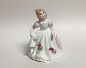 Figura de abril de Royal Doulton