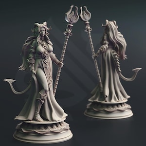 May include: A detailed, light-colored figurine of a female fantasy character with horns, a long flowing gown, and a staff. The figure is standing on a decorative base. The staff has a detailed top. The character has a tail and is posed in a regal stance.