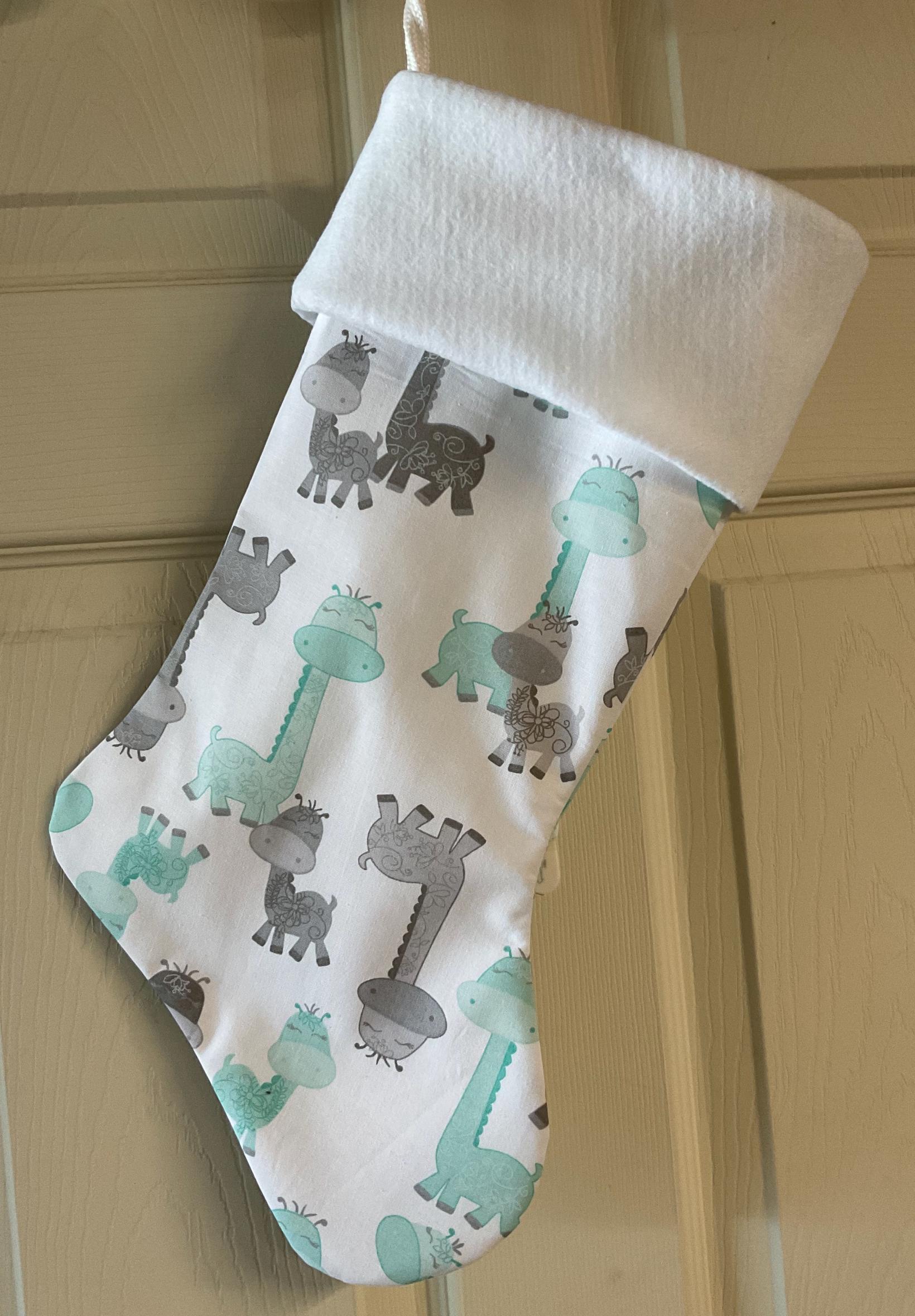 Discover Baby Giraffe Christmas Stocking