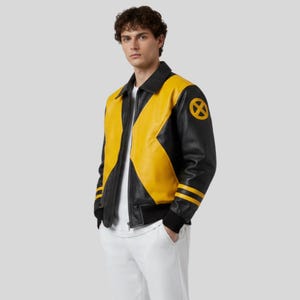 May include: A black and yellow leather jacket featuring a large yellow X pattern across the front, a classic collar, a front zipper closure, and a circular yellow X-Men logo patch on the upper left sleeve with two yellow stripes on the cuffs.