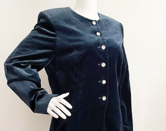 May include: A navy blue velvet blazer with a round neckline and silver buttons.