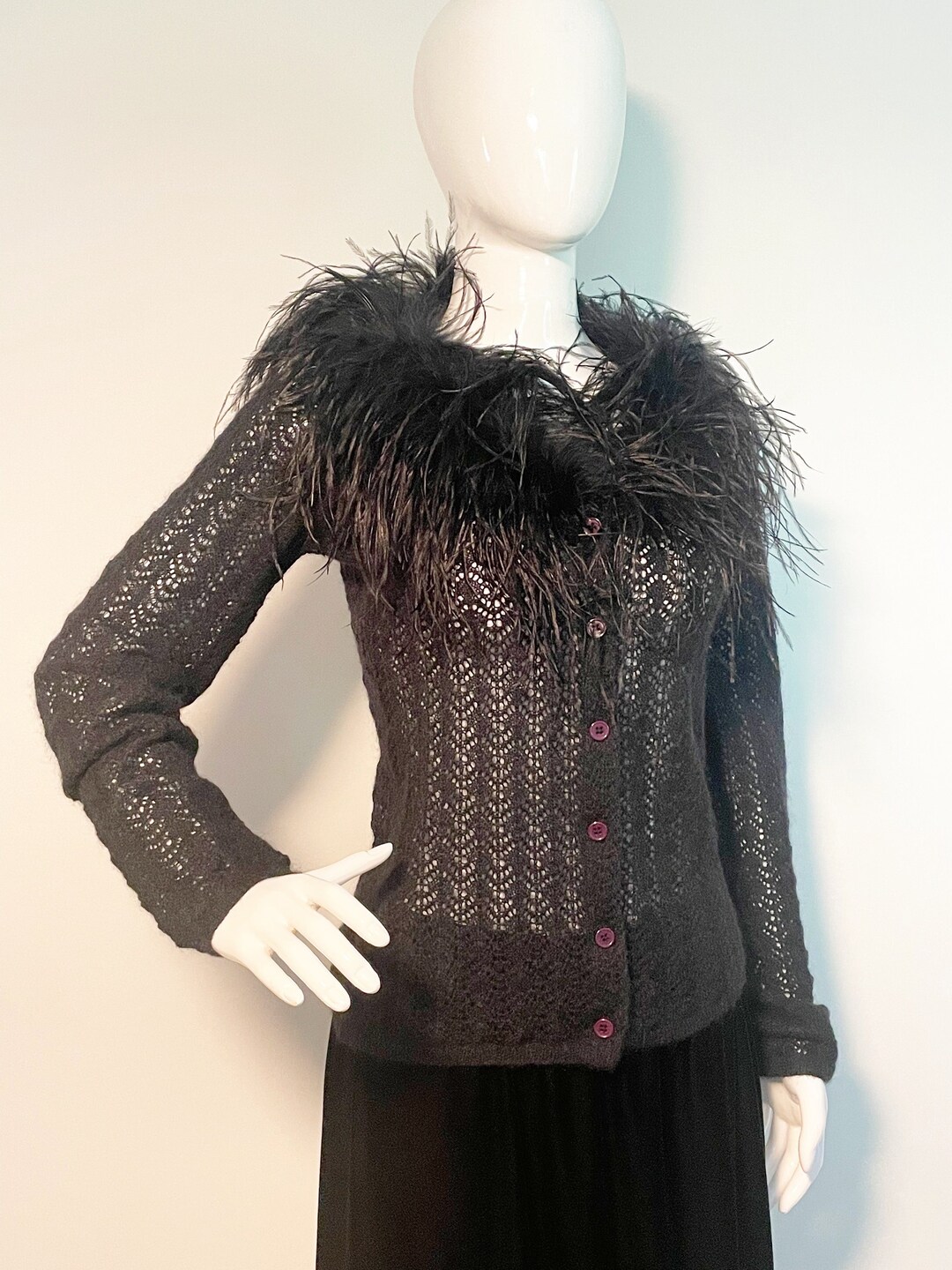 Ameri（アメリ）の「FEATHER OVER CARDIGAN WITH VEST（ニット