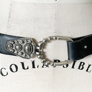 Vintage leather and silver tone statement belt, Sandy Duftler adjustable belt, black leather belt