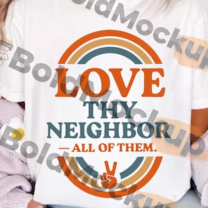 Puede incluir: Camiseta blanca con el texto "LOVE THY NEIGHBOR - ALL OF THEM." en naranja y verde azulado. El diseño incluye un arcoíris y un signo de la paz. Descarga digital del producto disponible.