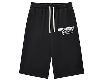 Pantalones deportivos tres cuartos con cordón ajustable y holgados