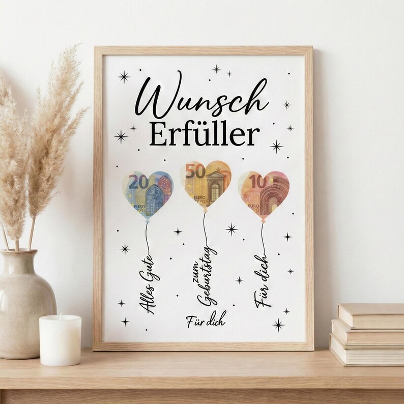 May include: A framed print with heart-shaped balloons made from Euro banknotes. The balloons display the numbers 20, 50, and 10. The print includes the text "Wunsch Erf&uuml;ller" and other German phrases.