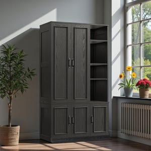 May include: A dark gray wooden cabinet with two sets of doors and open shelving. The cabinet has a traditional design with framed panels and metal handles. A small potted plant sits to the left, and a window with flowers is to the right.