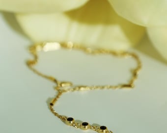 Minimalistiskt svart pärlhandskedjearmband