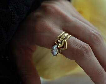 Öppen ring med hjärt- och pärlberlock