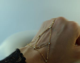 Armband med kristallkedja i flera lager