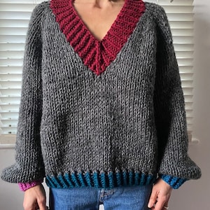 V-Neck Hand Knitted Jumper With Contrasting Colour Hems. Size M.