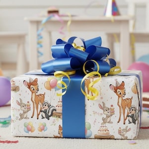 May include: A wrapped gift box with a blue bow and ribbon. The gift wrap features illustrations of Bambi, Thumper, and Flower with balloons and cakes. The background includes party decorations like balloons and a party hat.