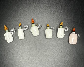 Pequeños adornos de velas