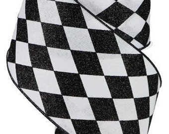 May include: A roll of decorative ribbon with a black and white checkered pattern. The ribbon is made of a textured material and is ideal for crafts, gift wrapping, or holiday decorations. The ribbon is approximately 2.5 inches wide.