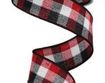 May include: Red, black, and white plaid ribbon with a black edge. The ribbon is woven and has a slightly textured surface.