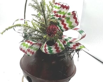 Red green zigzag Bow on rusty metal Jingle Bell Christmas Ornament with faux cedar and berries
