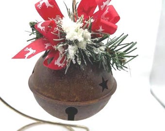 Red reindeer Bow on rusty metal Jingle Bell Christmas Ornament with faux snow pine and berries