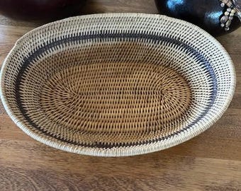 Tightly woven vintage tray basket Origin unknown