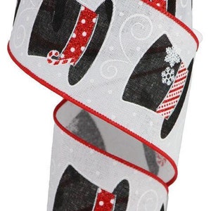 May include: White ribbon with a red trim and black and white snowman hats with red and white candy canes and snowflakes.