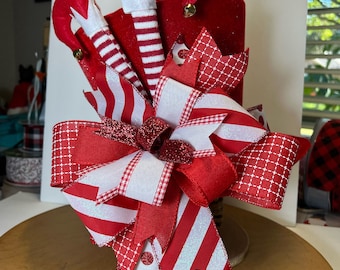 Red Large Top Hat Christmas Tree Topper/ Centerpiece with a Big Beautiful Bow and Elf Legs Sticking Out of the Bow