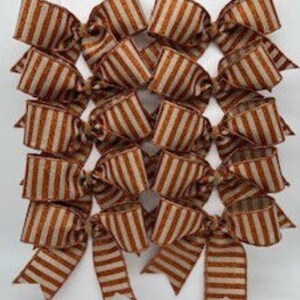 May include: Set of eight brown and white striped mini bows with glitter. The bows are approximately 2 inches wide and are perfect for adding a touch of rustic charm to your crafts.