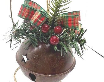 Red green plaid Bow on rusty metal Jingle Bell Christmas Ornament with faux pine and berries