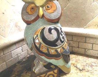 Multi color resin Owl with glass eyes and mirror inserts. No markings. Origin unknown. Egyptian style.