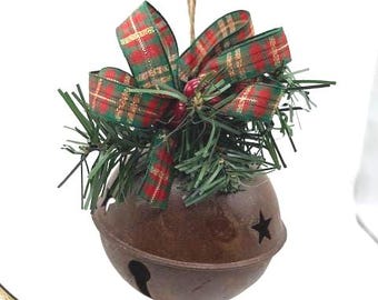 Red green plaid Bow on rusty metal Jingle Bell Christmas Ornament with faux pine and berries