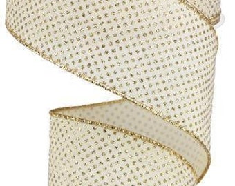 May include: A roll of ivory-colored ribbon with a gold glitter polka dot pattern. The ribbon has a gold wired edge.