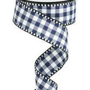 May include: White and navy blue gingham ribbon with black stitching along the edges. The ribbon is 2.5 inches wide.