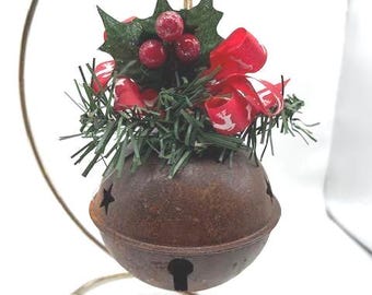 Red reindeer Bow on rusty metal Jingle Bell Christmas Ornament with faux pine and berries